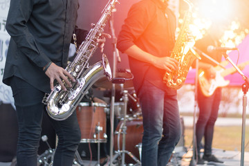 World Jazz festival. Saxophone, music instrument played by saxophonist player and band musicians on...