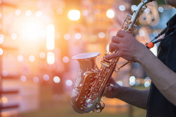 International jazz day and World Jazz festival. Saxophone, music instrument played by saxophonist...