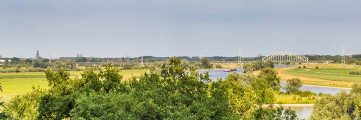 Landscape with a bridge over the Rhine near Arnhem in the Netherlands