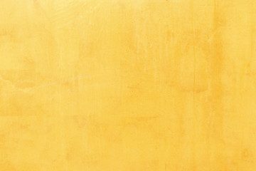 Shiny yellow leaf gold foil texture background