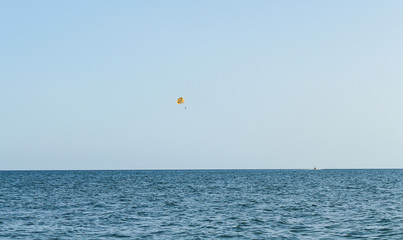 The seascape, the boat skates on the people