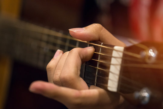 Music playing guitar concept : Hands Young man people that guitarist play for show live in concert