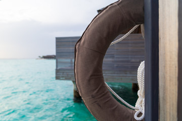 Life ring in luxury resport background.