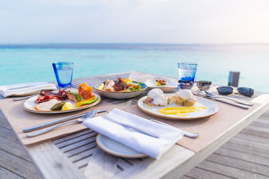 Luxury breakfast food on wooden table.