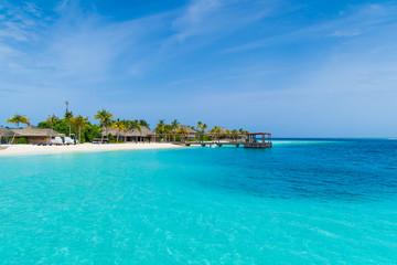 Naklejka na ściany i meble Beautiful tropical Maldives island on the beach background.