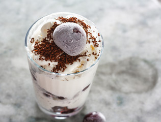 Ice cream with cherry berries on  beautiful marble countertop background