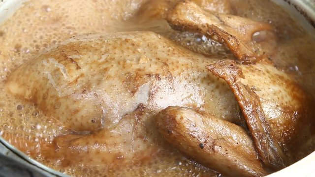 Boiling  duck with sauce  to make stewed duck, Chinese or Thai food