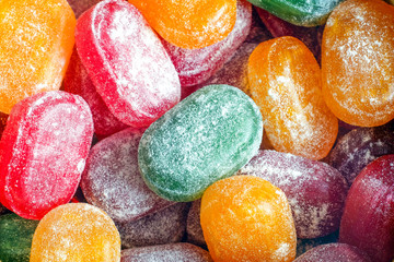 A jar of bright candy. The joy of children, a lot of sweets. Candy assorted colors. Caramel in...