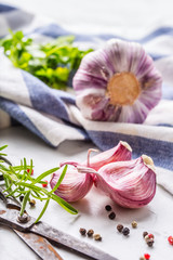 Garlic Cloves and Bulbs with rosemary salt and pepper.