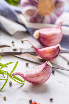 Garlic Cloves and Bulbs with rosemary salt and pepper.