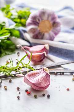 Garlic Cloves and Bulbs with rosemary salt and pepper.