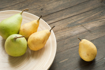 pears on wooden table