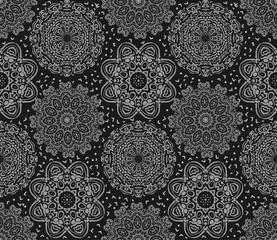 Vector seamless pattern. Eastern texture for textiles, fabrics, flax. Abstract ornament with a contour mandala. Black and white texture of the East in the style of Damascus. Vintage Wallpaper Template