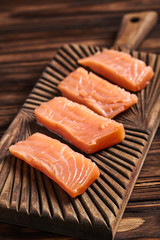 Salted salmon on the wood background