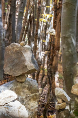 Rock balancing on forest background at Vitosha Mountain, Vitosha Nature Park, Sofia, Bulgaria