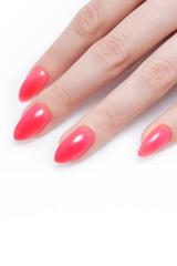 Women's manicure, on a white background. Nail Polish red coral color.