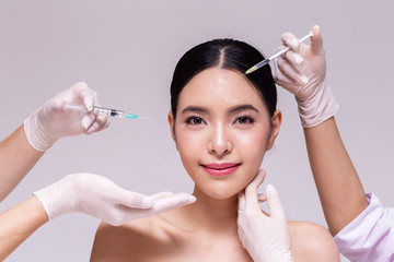 Mixed Asian young 20s woman going through skin care and aesthetic medical therapy and to be...