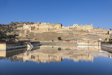 beautiful amber fort with reflection in lake