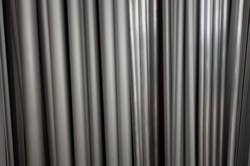 Creative background from aluminum profile of different cross-section.