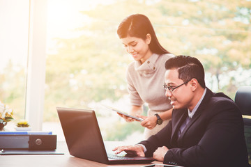 Businessman And Businesswoman Meeting In Modern Office.