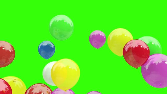 color baloons floating away on green background