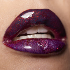 Wet red violet lips with drop