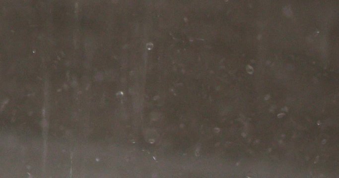 water drop splash calm relaxing abstract shower scene in slow motion