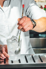 Bartender making alcoholic cocktails! Cocktail bar in summer 