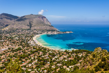 Panoramic view of the seaside resort town of Mondello in Palermo, Sicily. White beach and turquoise crystal clear sea. HD View of the gulf from the top of Monte Pellegrino.