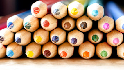 Colored pencils background. Close up