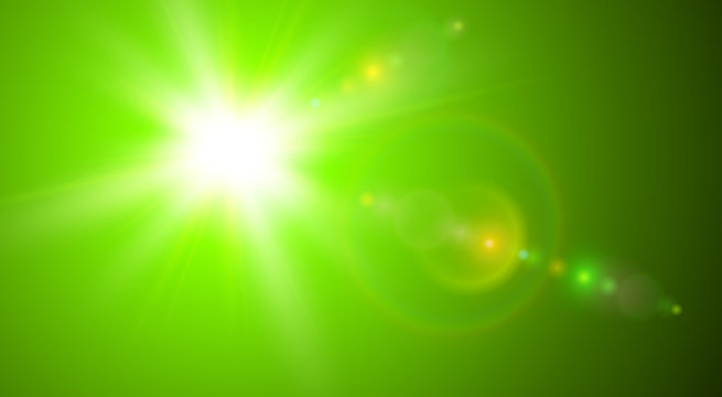 Green sunny background, sun with lens flare