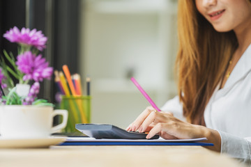 close up hand use calculator for business / accountant financial / working concept