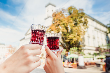 Two wineglasses with cherry wine