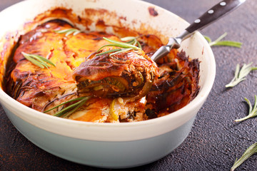 layers of, zucchini, eggplant, in cream sauce with rosemary