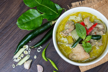 Chicken Green Curry on wooden background. Thai Traditional And Popular Food.