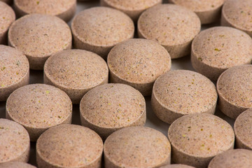 herbal pills isolated on white background