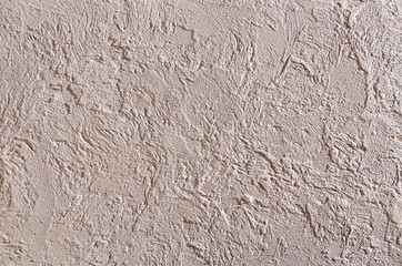 Close-up surface detail of old rough white plaster wall texture, macro.