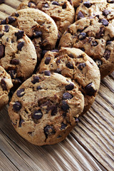 Chocolate cookies on table. Chocolate chip cookies shot with chocolate