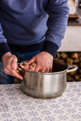 Man is mixing the minced. Process. Photo set