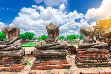 Buddha statues at the temple of Wat Chaiwatthanaram in Ayutthaya near Bangkok, Thailand.