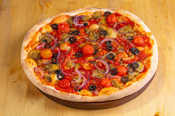 Pizza with mushrooms and tomatoes
