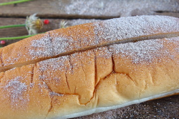 fresh tasty homemade bread on old wooden