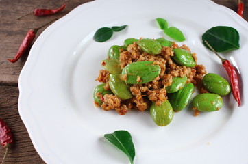 fried pork with stink bean food in thailand