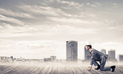 King businessman in elegant suit running and modern cityscape at