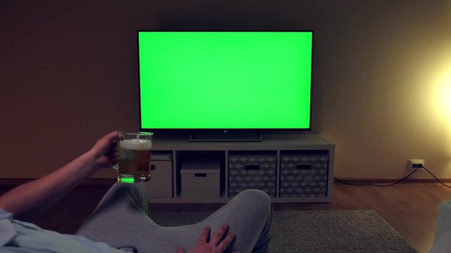 Unhappy and disappointed man watches football