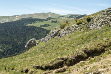 Obraz premium View of Bucegi Mountains, Bucegi National Park, Romania, clear blue sky, few clouds, sunny summer day, perfect for hiking