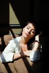 young woman in bra and shirt