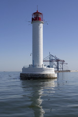 Odessa lighthouse on a sunny day, seascape Ukraine.