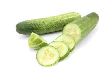 green cucumber on white background