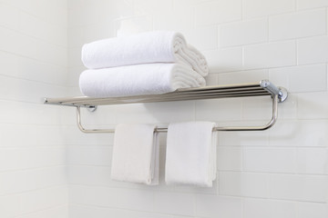 White towel on hanger rack in bathroom